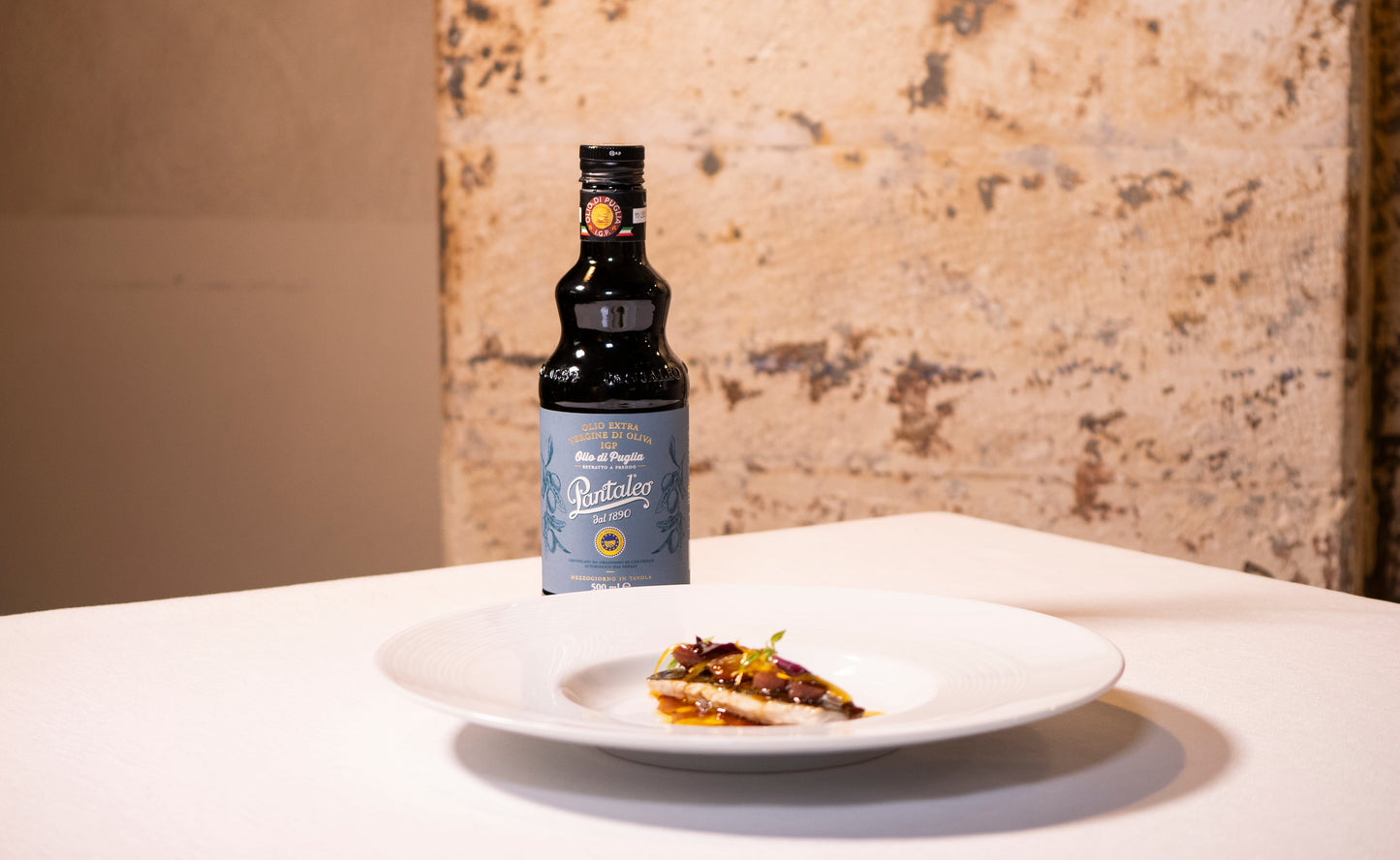 Cefalo in olio cottura, scalogno e limone caramellato