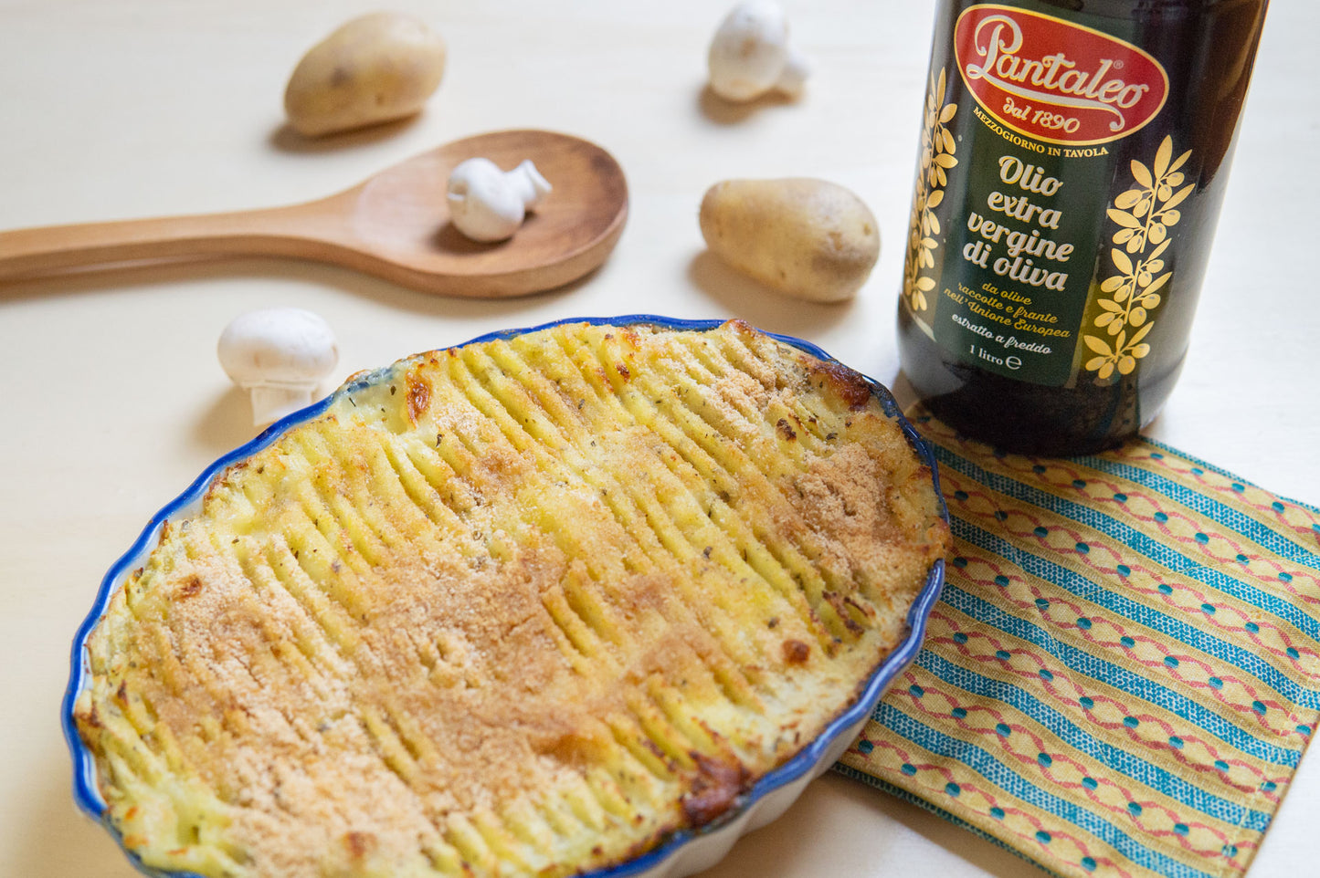 Olio Pantaleo - Gateau di patate al forno con mozzarella e funghi