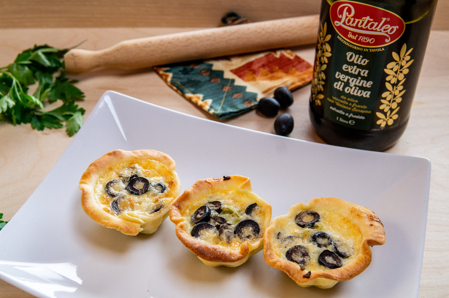 Olio Pantaleo - Mini quiche di porri e olive nere