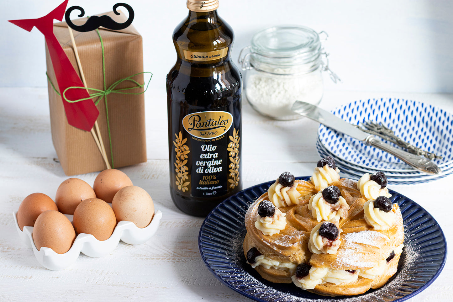 Olio extra vergine di oliva 100% italiano - Torta bignè all'olio di oliva con crema e amarene