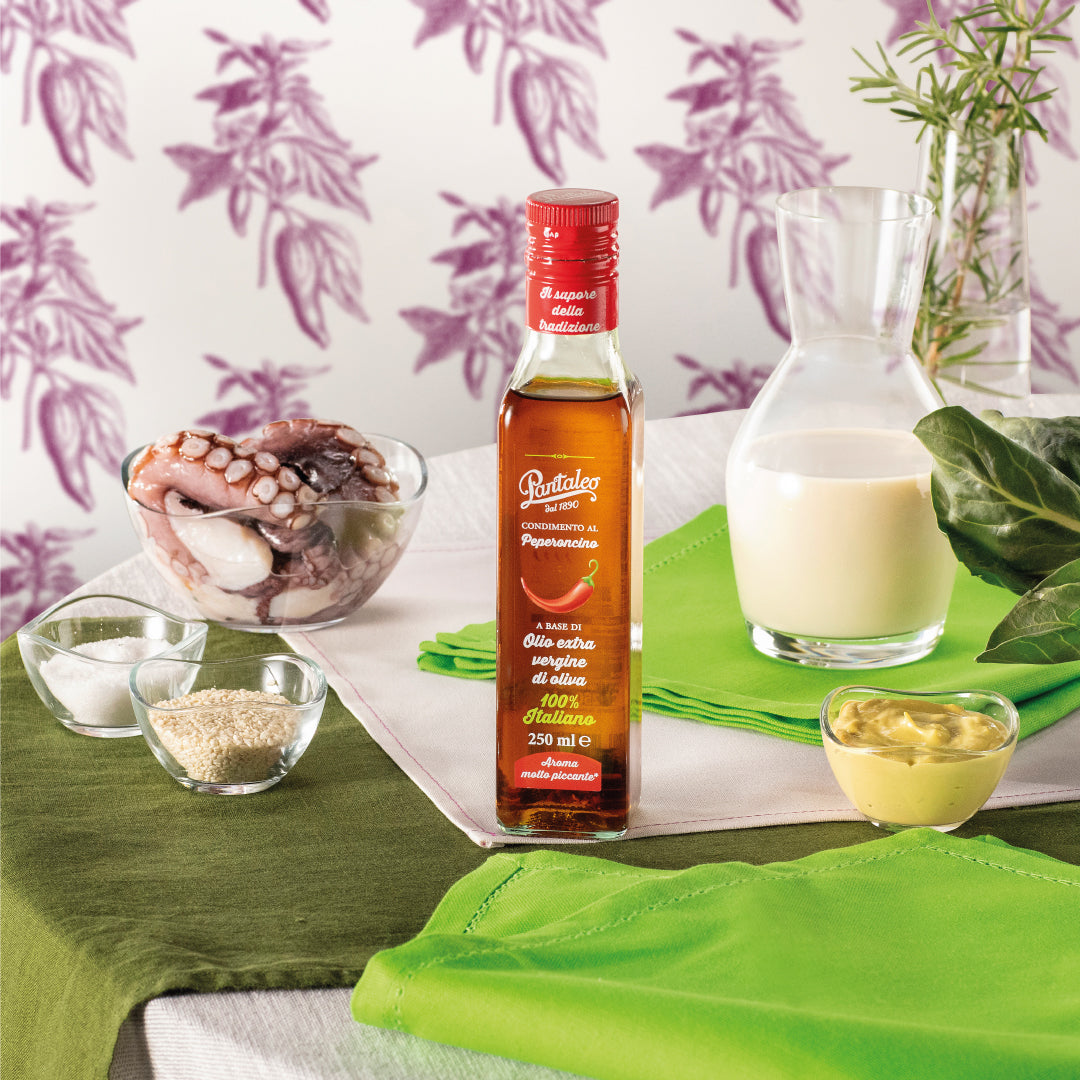 Dressing made with 100% Italian extra-virgin olive oil, flavoured with chilli pepper