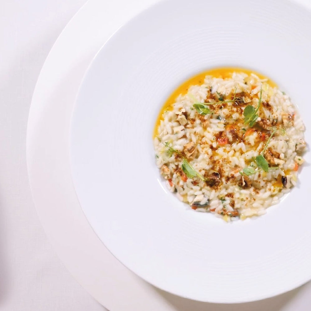 Risotto primavera, noci e olio al peperoncino