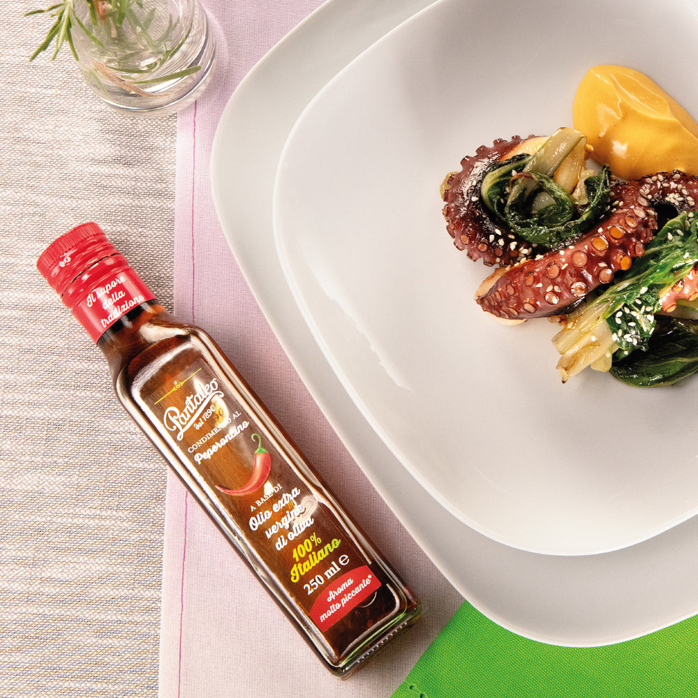Condimento a base di olio extra vergine 100% italiano aromatizzato al peperoncino